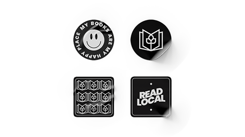 A set of four Book Haven Bookstore stickers that promote reading